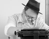 070525_ManWritingBW man writing
