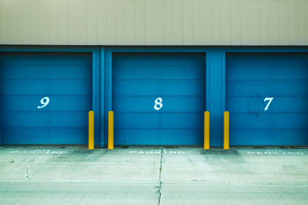 A row of storage units painted in blue.