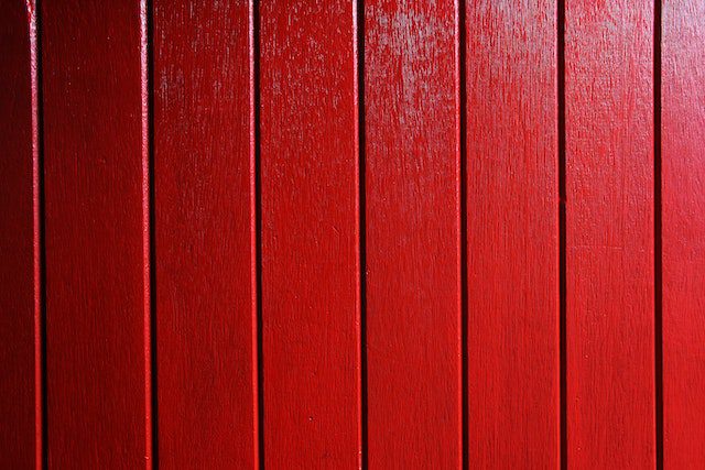 Red painted wooden surface