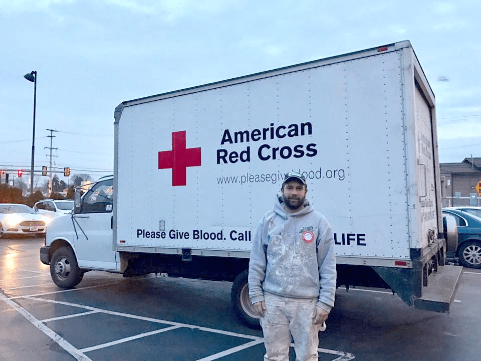man standing in front of truck