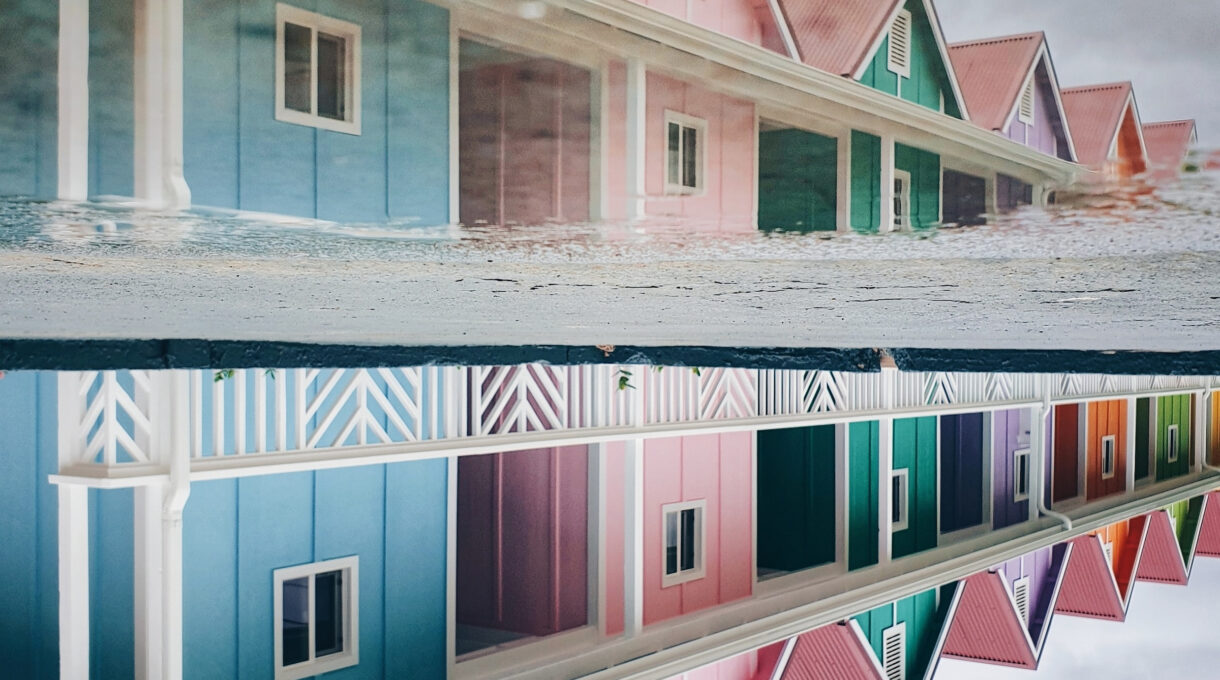 A row of colorful houses showing the results of working to protect your paint job
